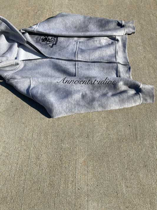 “Iron crest” zip-up